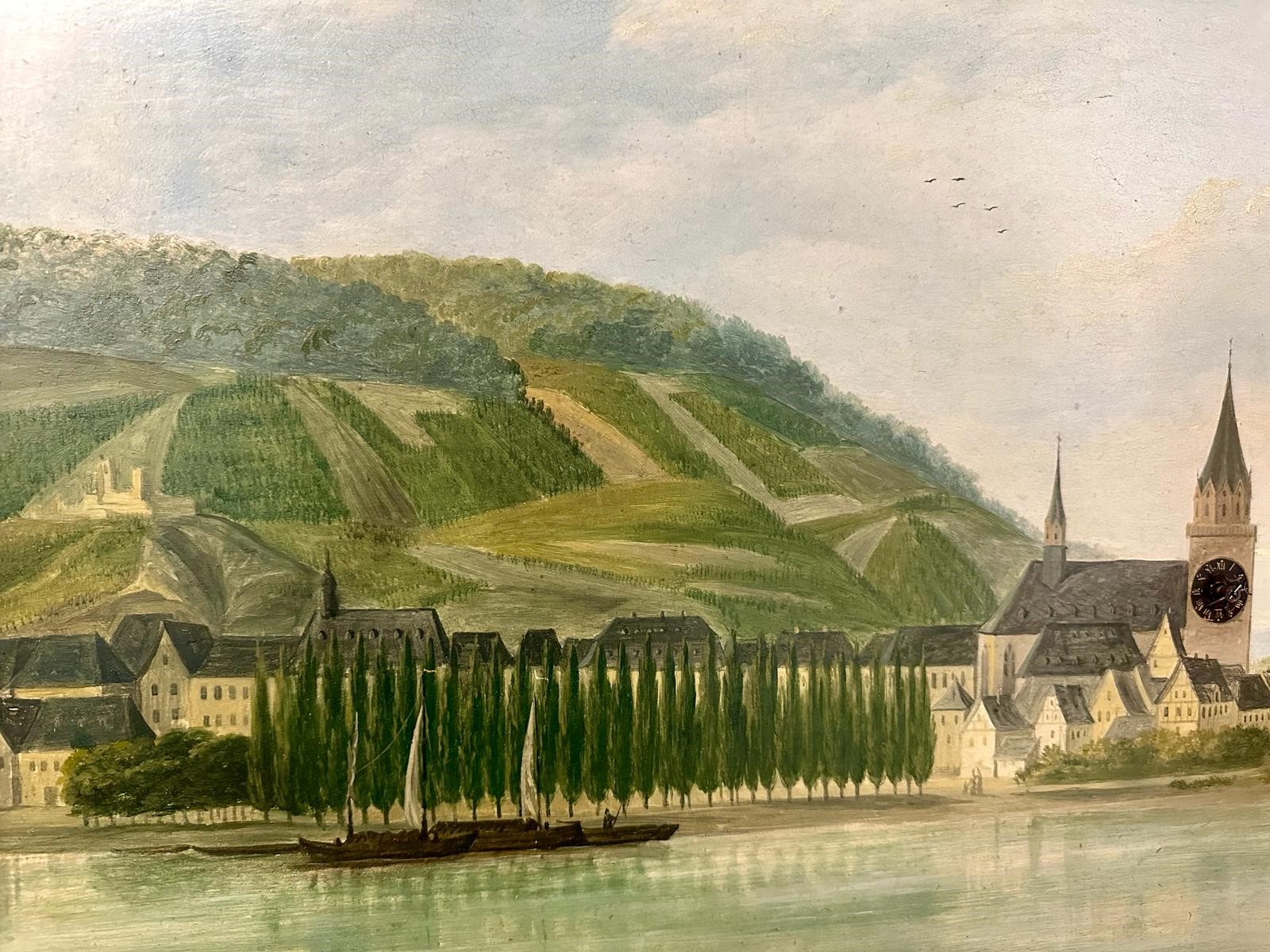 Bilderuhr aus dem Biedermeier voll funktionstüchtig mit der Martinskirche von Bingen und gegenüber dem ehelmaligen Kloster der Hildegard von Bingen.