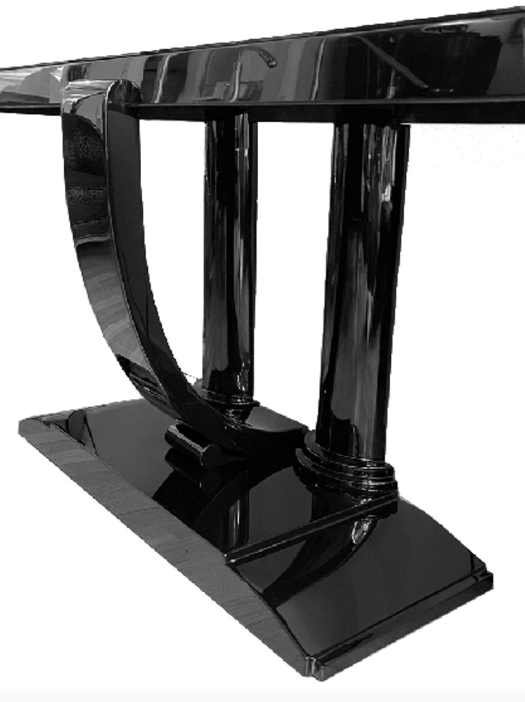 art-deco-konsole in schwarzlack von 2 halbsäulen getragene Deckplatte mit nach vorne geschwungener pilasstersäule - fein profiliert und mit schwarz gefärbter Glasplatte versehen.