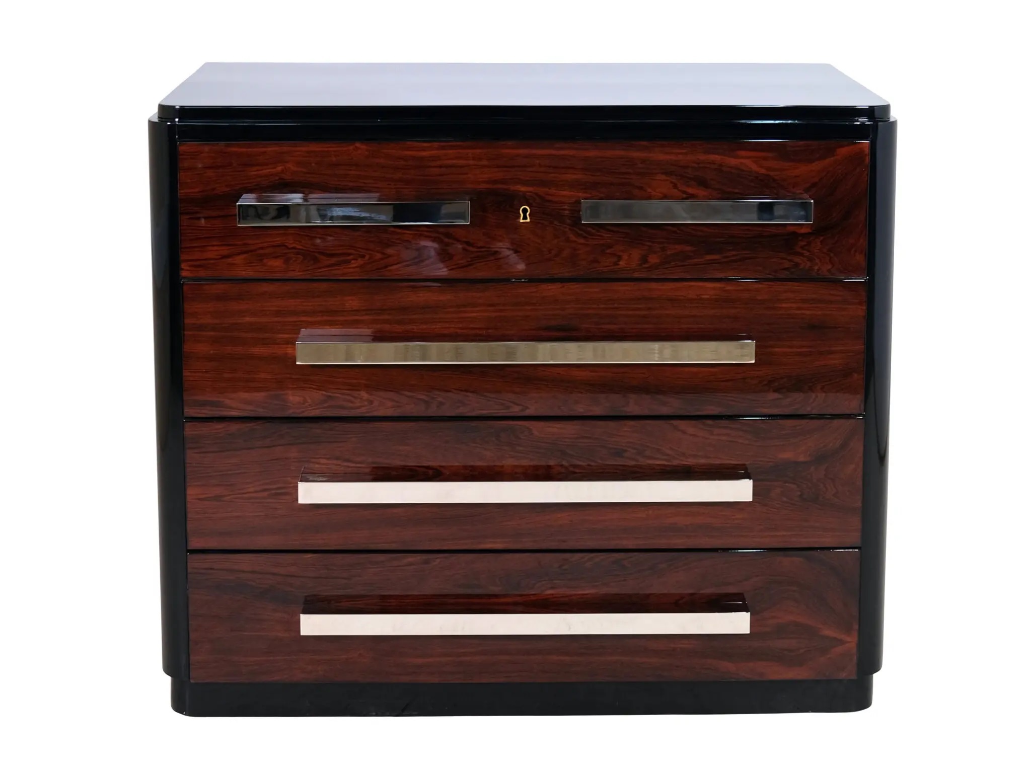 Four-drawer chest of drawers with nickel-plated metal fittings.