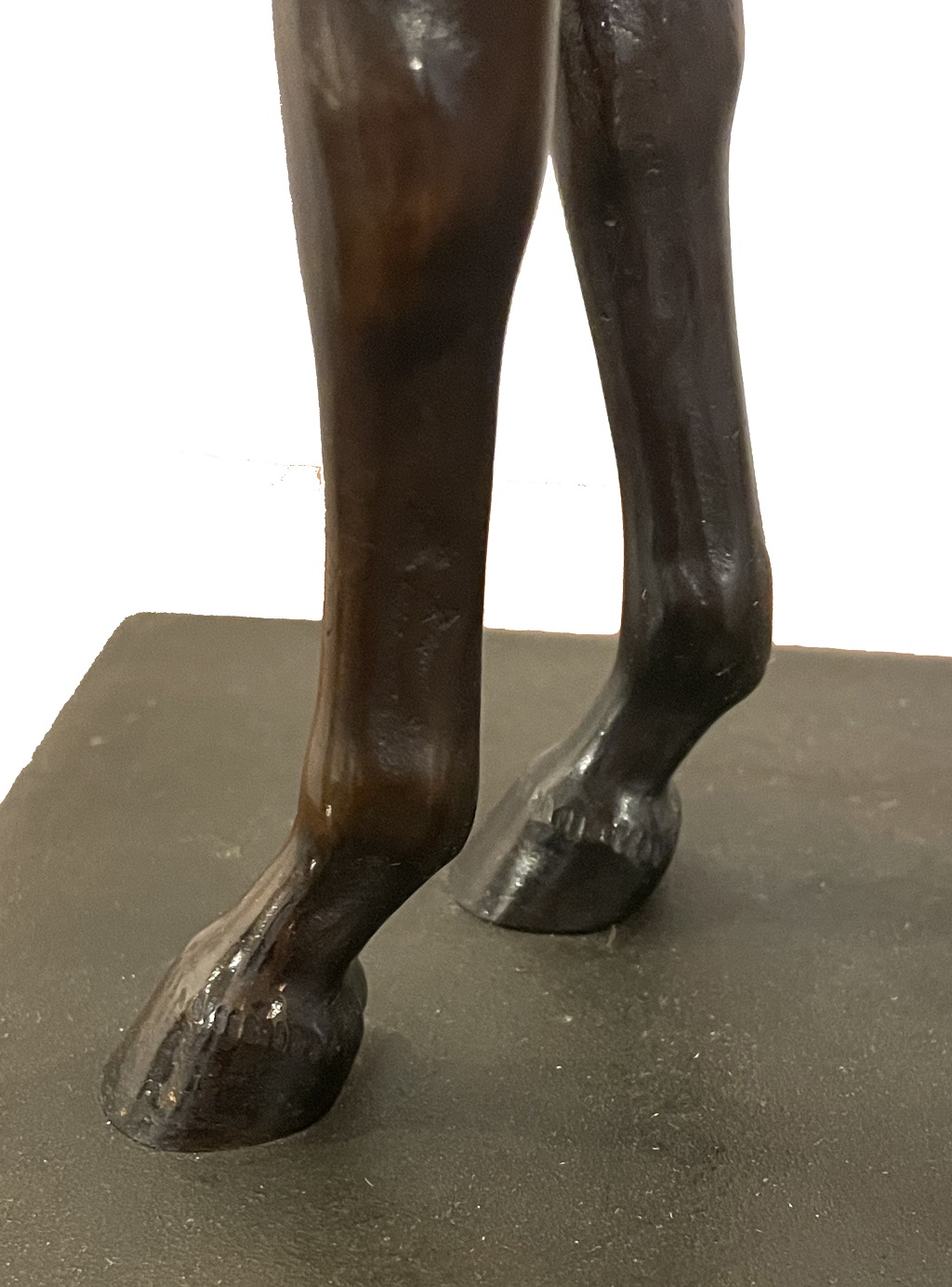 Standing mare, bronze, on flat rectangular