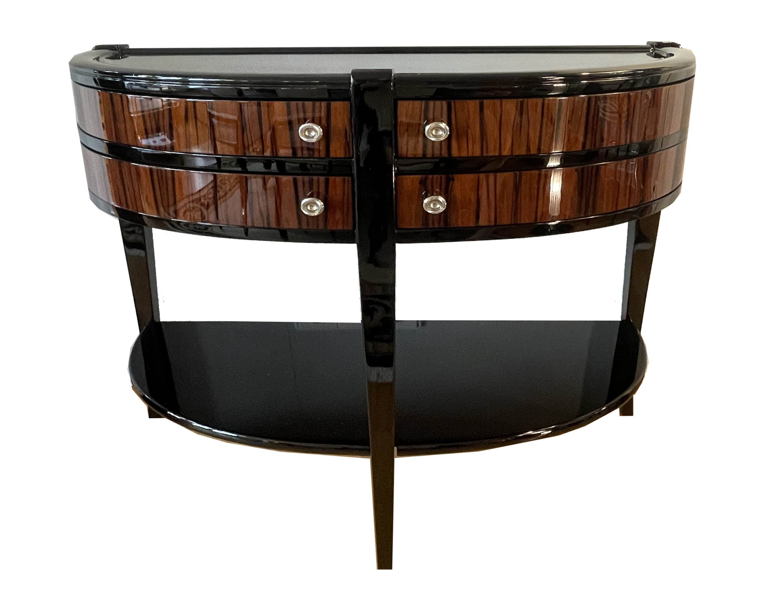 Makassar und Schwarzlack furniert.<br>Halbrunde Form mit 4 schwenkbaren Schubladen.<br>Ein Ablageboden.<br>