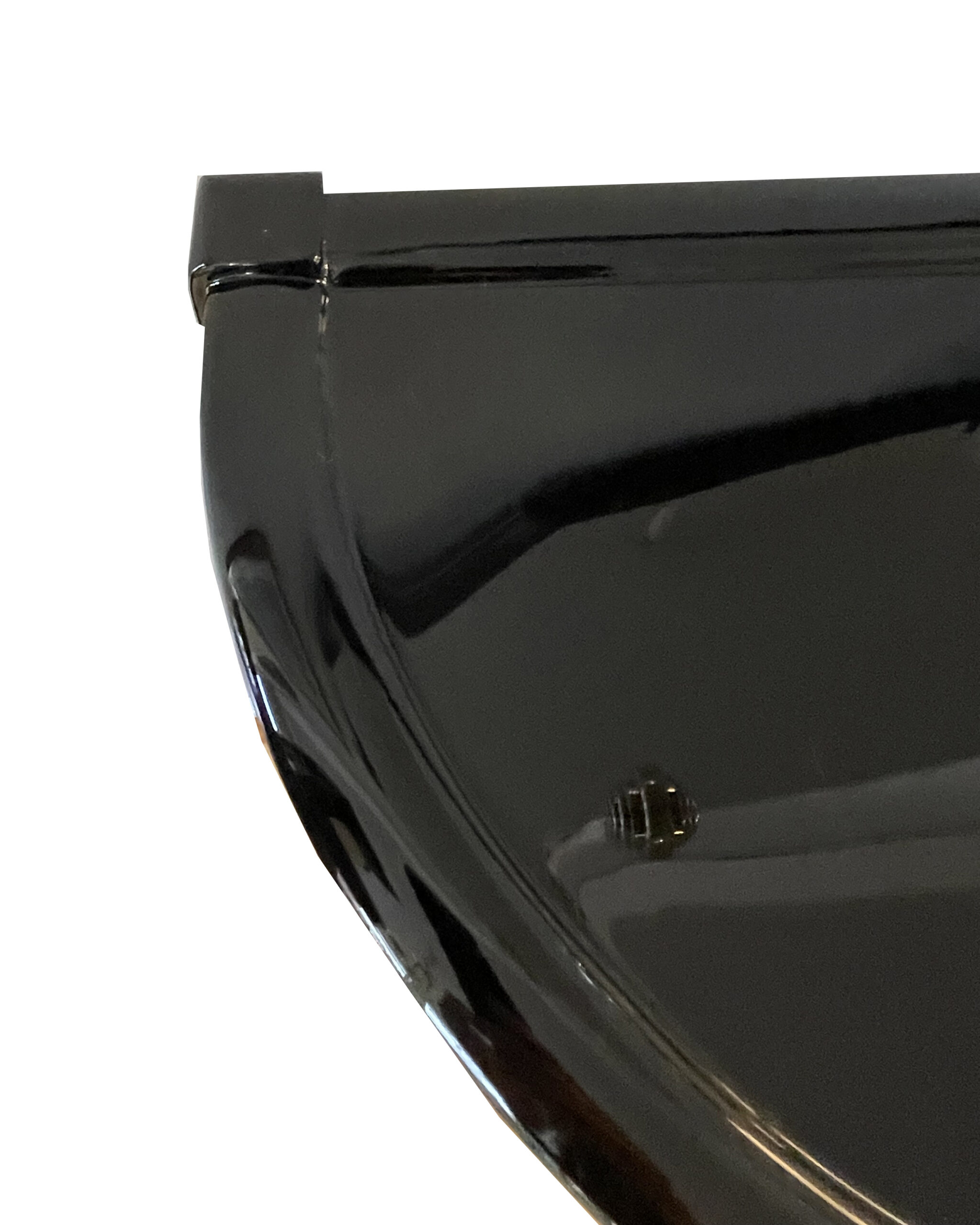 Makassar und Schwarzlack furniert.<br>Halbrunde Form mit 4 schwenkbaren Schubladen.<br>