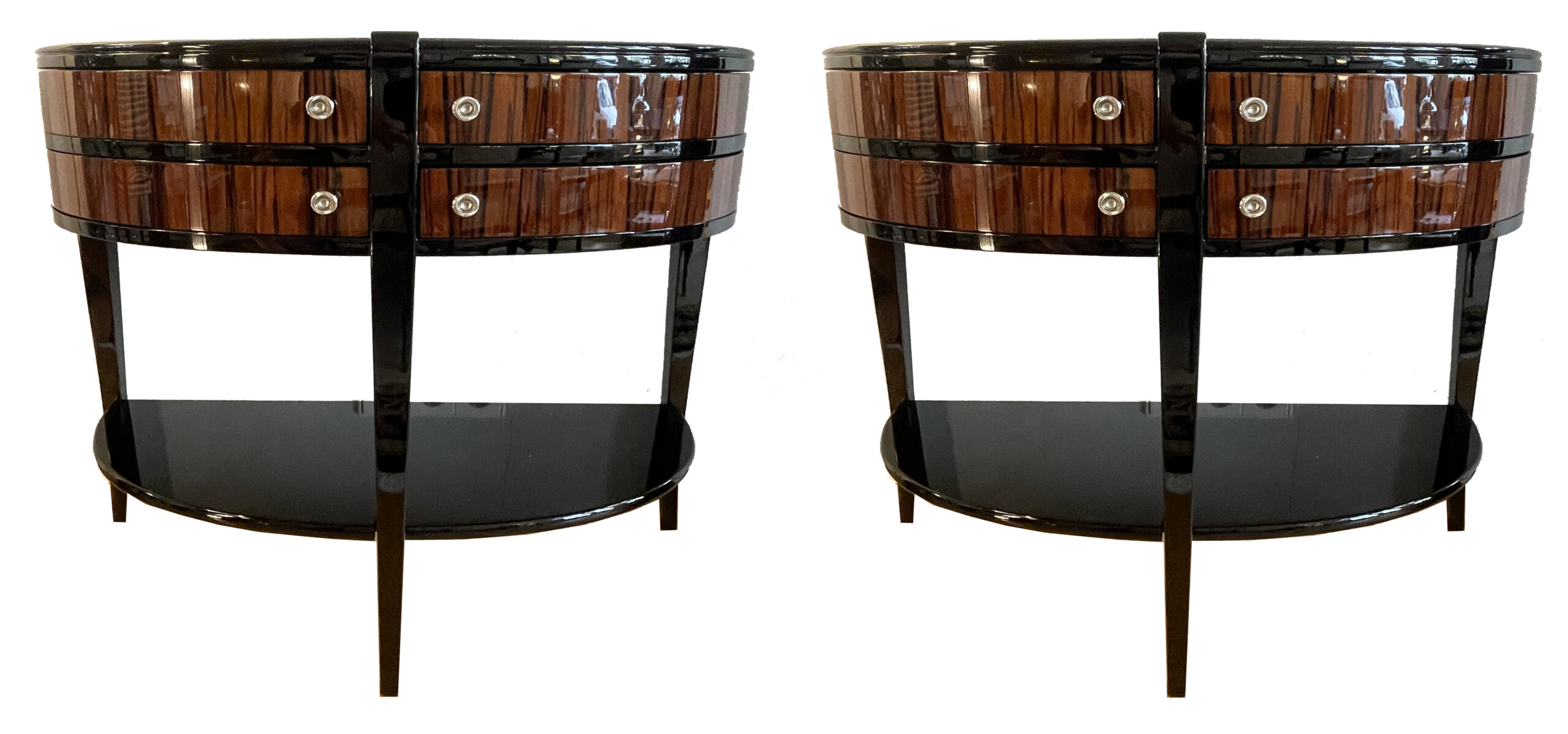 Makassar und Schwarzlack furniert.<br>Halbrunde Form mit 4 schwenkbaren Schubladen.<br>