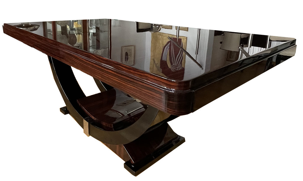 Side view showing two arches on the base supporting the tabletop – very beautiful Makassar wood.