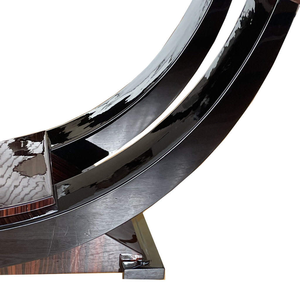 Detail of the gondola-style base of the Art Deco dining table.