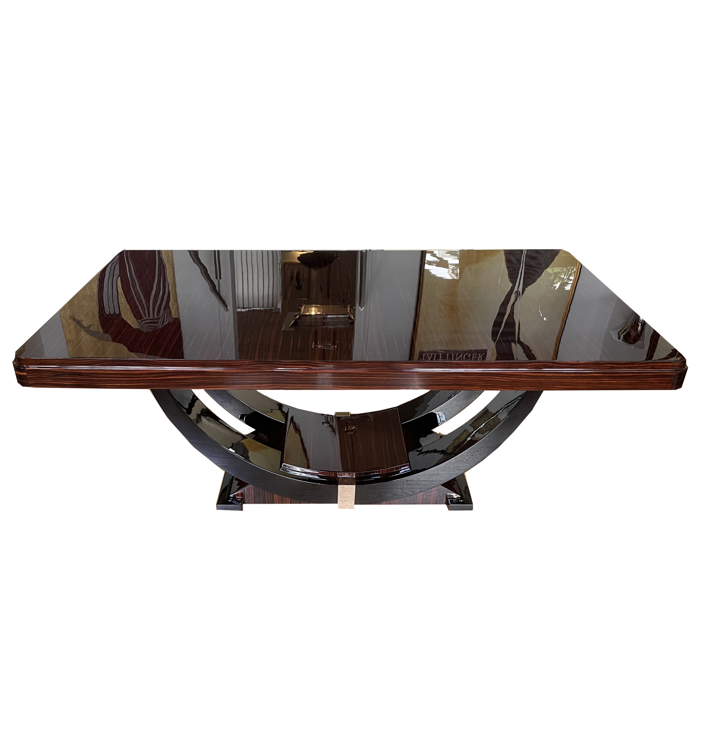 Art Deco dining table in Makassar ebony, accented with black lacquer and chrome – extendable – gondola-style base, France, circa 1930.
