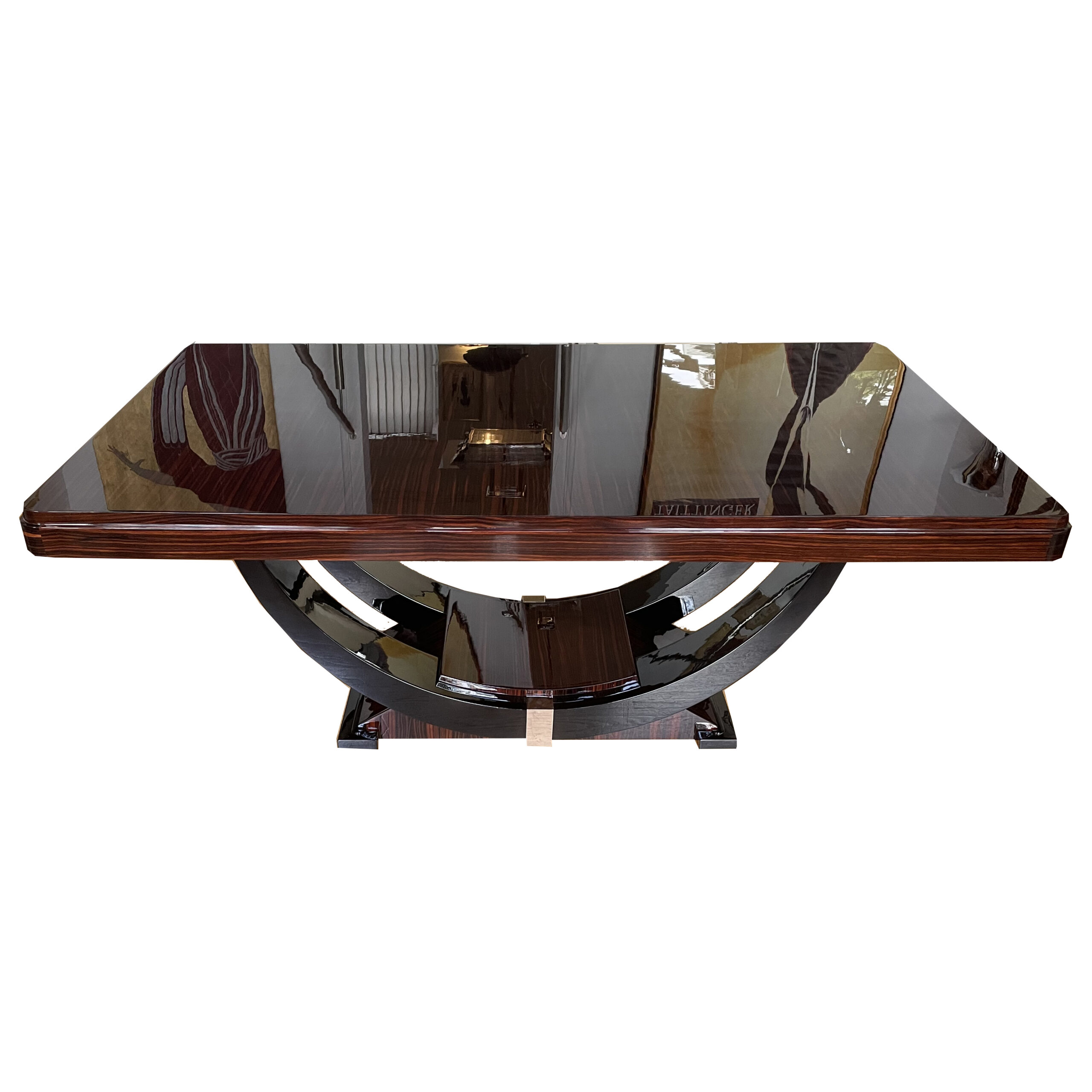 Art Deco dining table in Makassar ebony, accented with black lacquer and chrome – extendable – gondola-style base, France, circa 1930.
