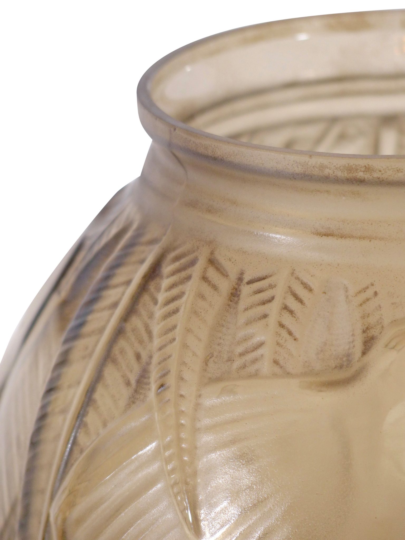 Close-up of the vase’s rim, leaf pattern and elephant relief in smoky glass