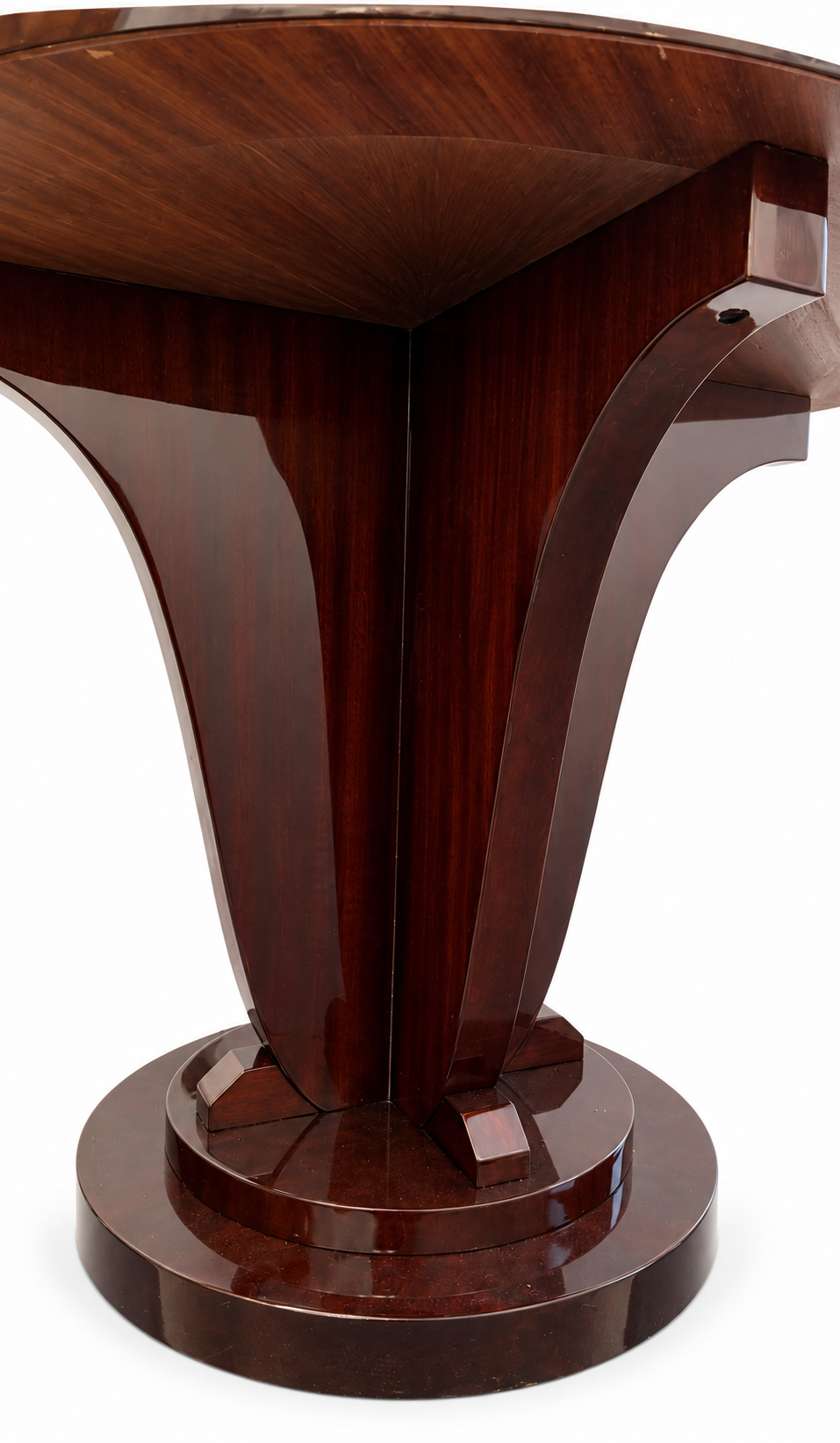 View from above of the circular tabletop with mahogany veneer arranged in a starburst pattern