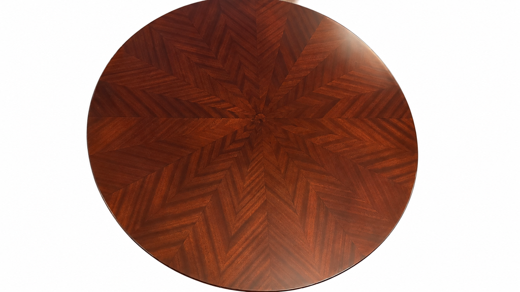 Close-up beneath the tabletop showing the curved supports and polished mahogany