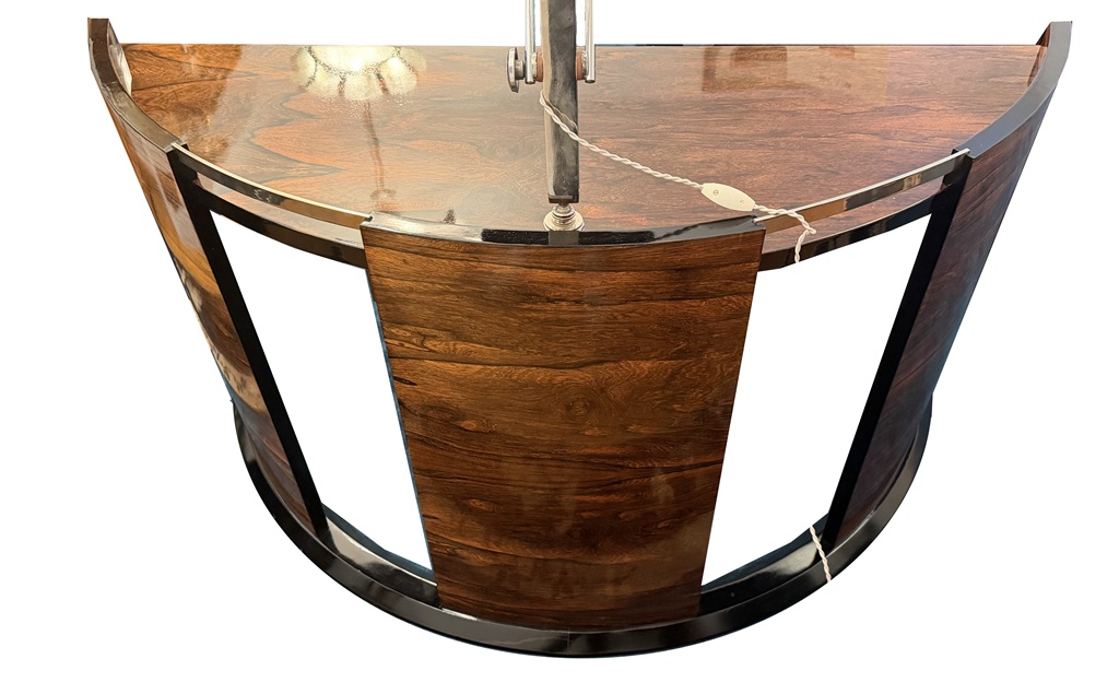 Rear view of the Art Deco desk showing its curved veneered panel and open sections