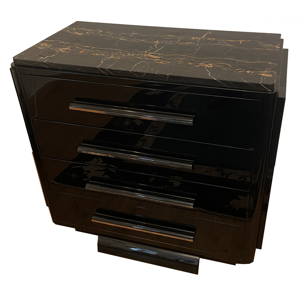 Straight-on view of the black Art Deco chest with four horizontal drawer handles